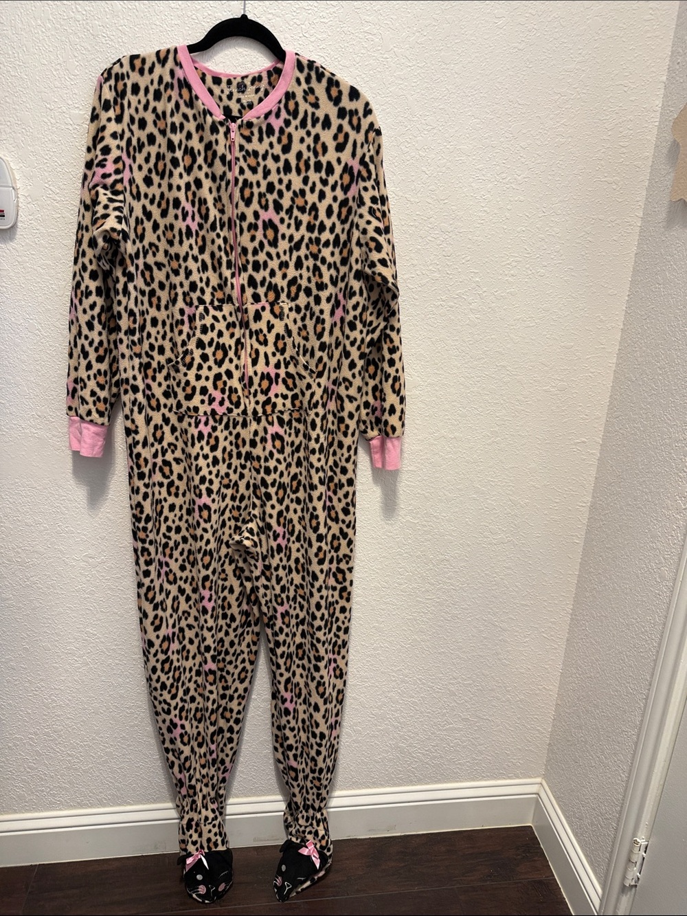 Woman’s Leopard Print One-Piece Pajamas with Pink Trim